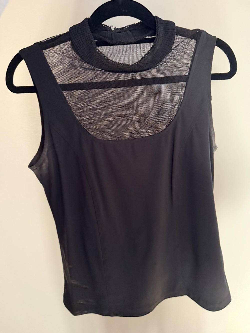 Black Tristan Tanktop. High-neck, mesh detailing $34